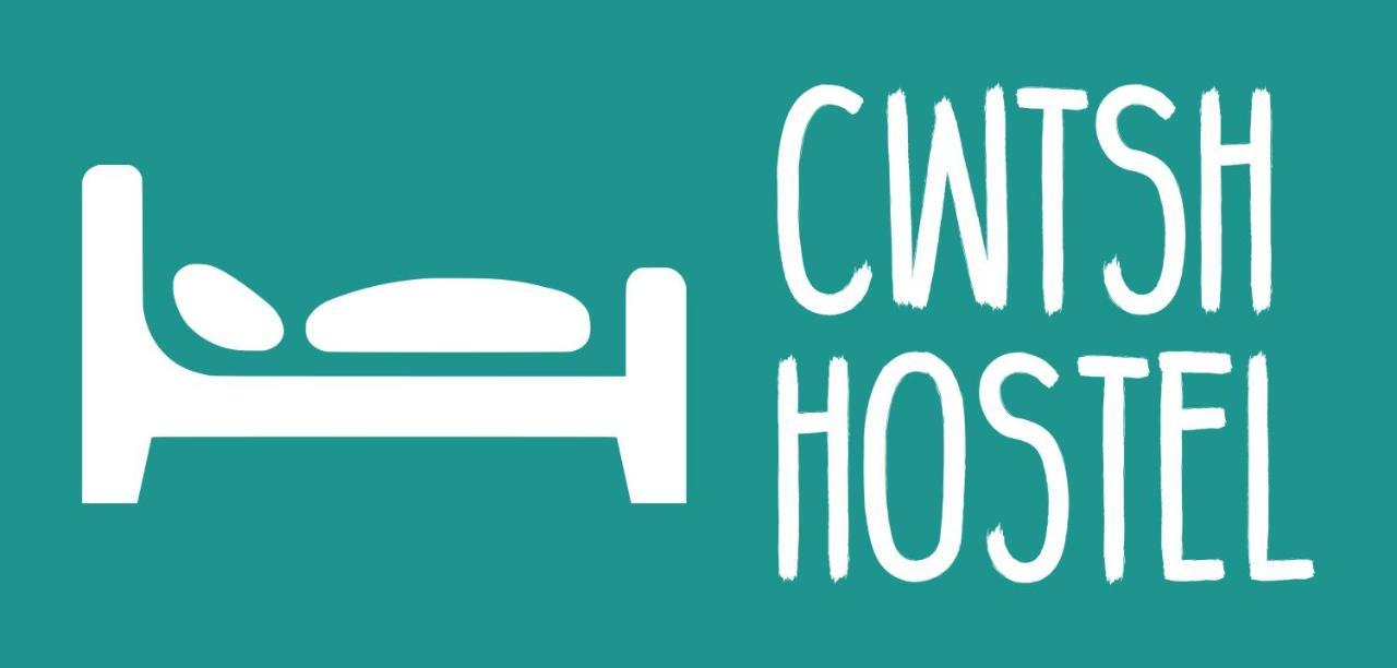 Cwtsh Hostel Swansea Buitenkant foto CWT hosts logo